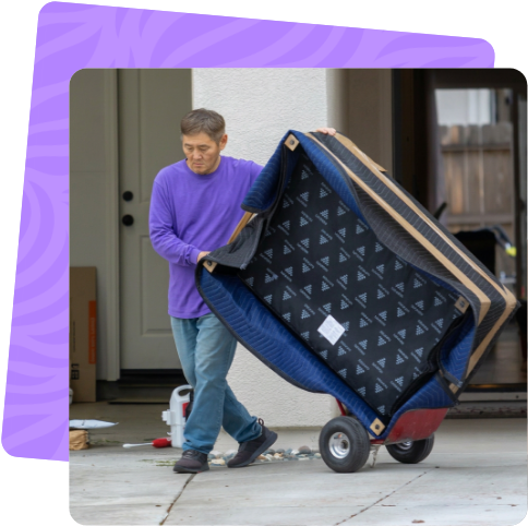 Ventura mover moving a mattress on a dolly in Santa Paula